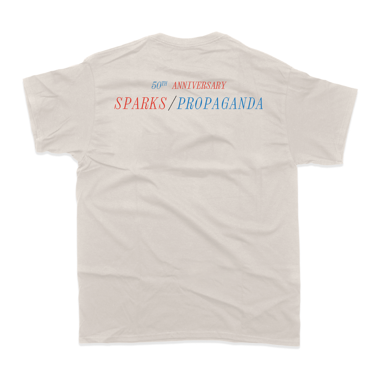 Beige t-shirt with ’60th ANNIVERSARY SPARKS/PROPAGANDA’ text printed on the back.